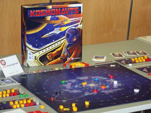 Komsonauts box and components on display at Spiel '12