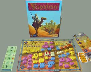 Photo of Yspahan box, board and pieces showing a game in progress